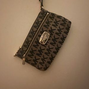 Large brown and black michael kors wristlet